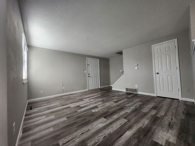 Building Photo - 2-Bedroom Townhome with Fenced Backyard and Modern Updates! |Utilities Included!