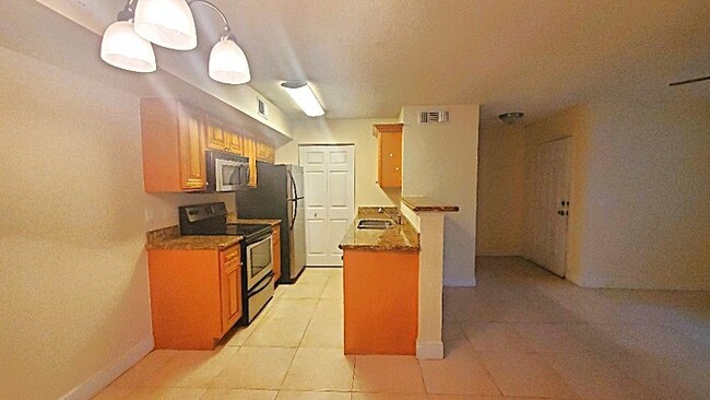 Building Photo - 01 + Den water included - Frist Floor unit...