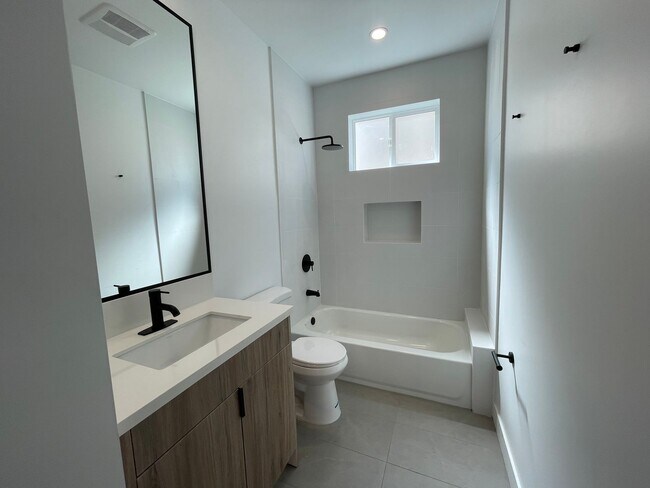 Building Photo - JUST COMPLETED MODERN TOWNHOMES! Never Liv...