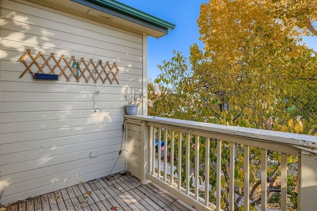 Building Photo - Light-Filled Corner Condo with Garage + Covered Parking in Gated Community