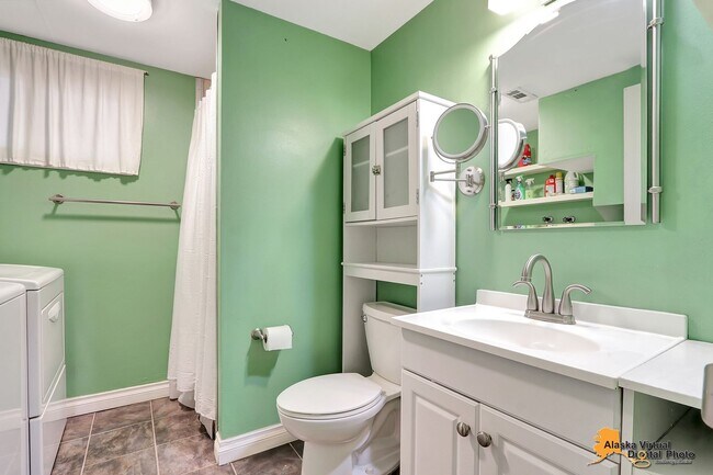 Building Photo - Eagle River Home w/ Fenced Yard, Sunroom, and Garage!