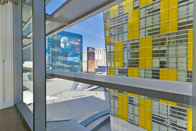 Building Photo - Veer Towers 1009W- Partial Strip Views fro...