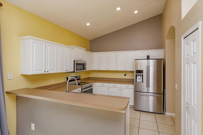 Building Photo - High Ceilings, Gourmet Kitchen, and a Playground – Where Life's Little Pleasures Meet!