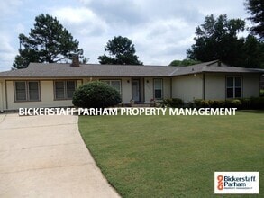 Building Photo - 4 Bedroom 2 Bath Located Off Of Double Chu...