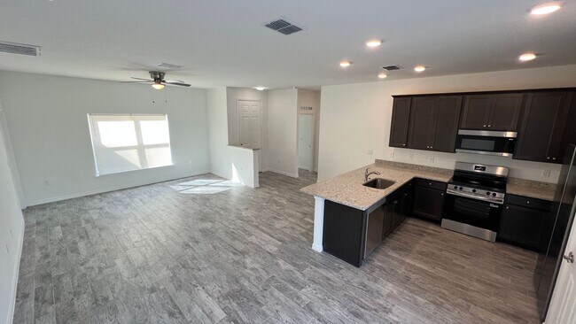 Building Photo - BRAND NEW! Be the FIRST To live here!