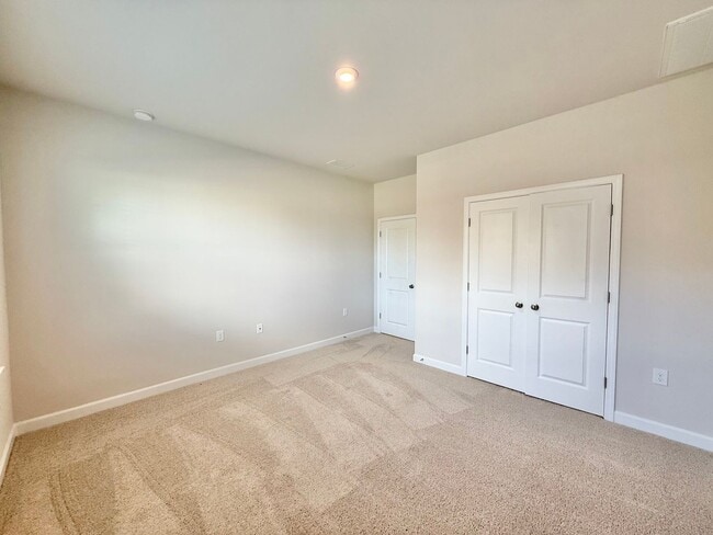 Building Photo - **OFFERING RENT PROMOTION FOR FIRST 6 MONTHS** New Construction 4BD, 3.5BA Wake Forest Townhome w...