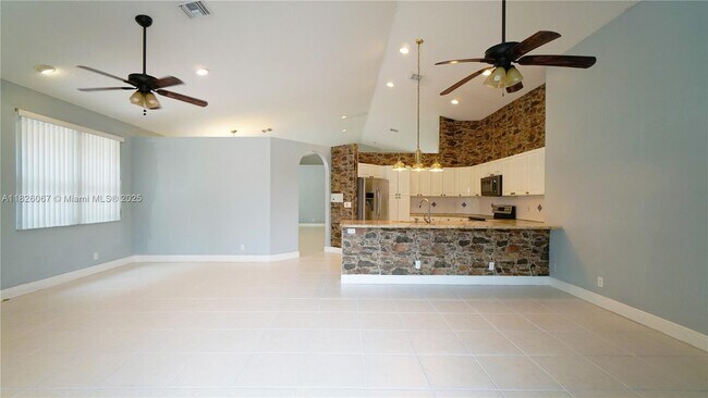 Building Photo - 9025 Long Lake Palm Dr