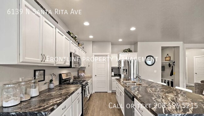 Building Photo - 6139 N Santa Rita Ave
