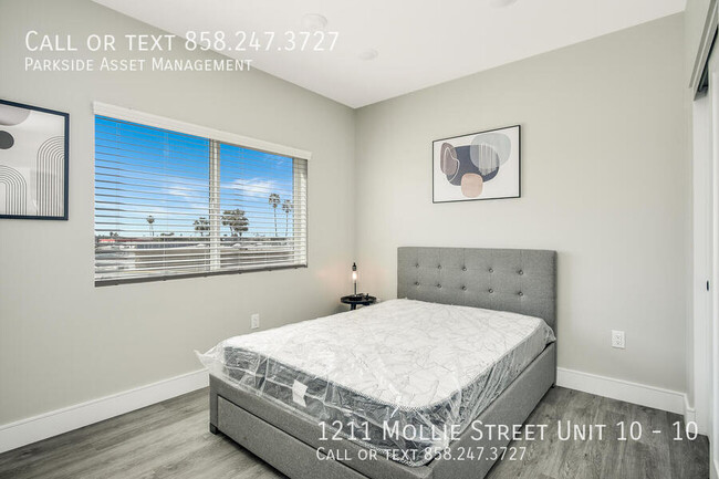 Building Photo - $1,000 Move-in Credit! The Carl on Lauretta