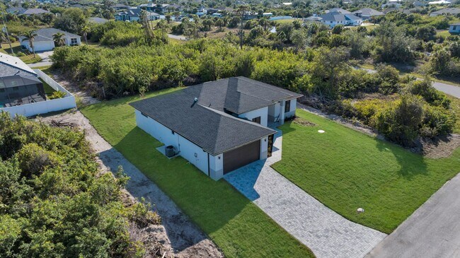 Building Photo - Brand-New Home for Rent – Port Charlotte, FL 33981. Qualify for a deposit-free option and save on...