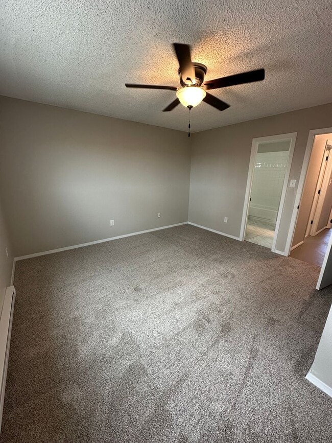 Building Photo - BEAUTIFULLY UPDATED 3 BEDROOM, 2 BATHROOM TWIN HOME WITH ATTACHED 1 CAR GARAGE