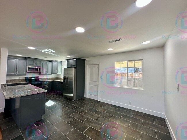 Building Photo - Modern 3-Bed Home with Fireplace, Backyard Entertaining Space & Prime Location