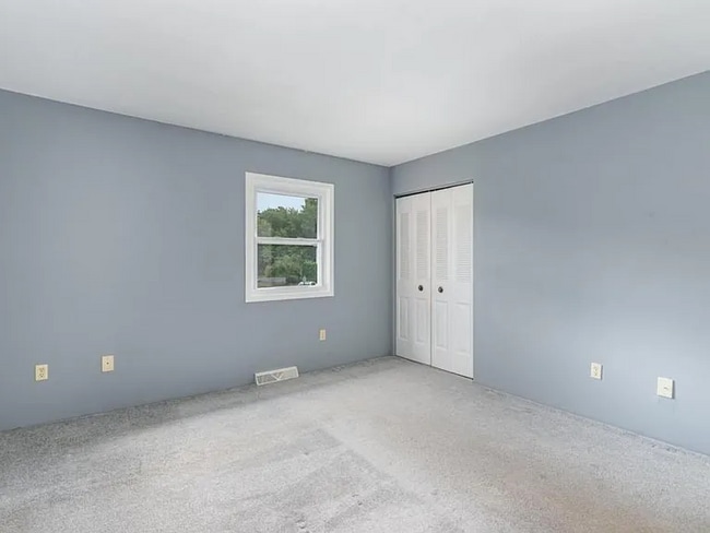 Building Photo - This charming house offers a cozy and comfortable living space.
