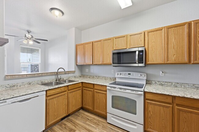 Building Photo - $1,945.95 - 2 Bed, 2.5 Bath Townhome in Colorado Springs with Attached Garage!