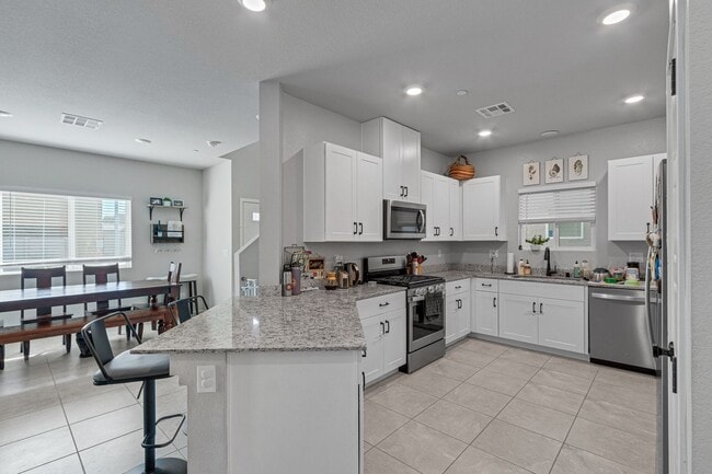 Building Photo - GORGEOUS TOWNHOME BUILT IN 2020 LOCATED IN A GATED COMMUNITY!