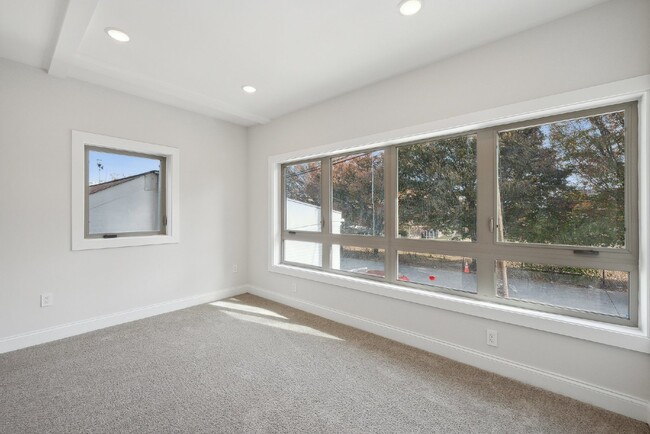 Building Photo - "NEW CONSTRUCTION Urban Living: Spacious 4...