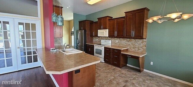 Building Photo - 4 br, 2 bath House - 6815 Amici Court