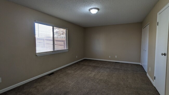 Building Photo - SPACIOUS TWO STORY 3 BED/2.5 BATH WITH FEN...