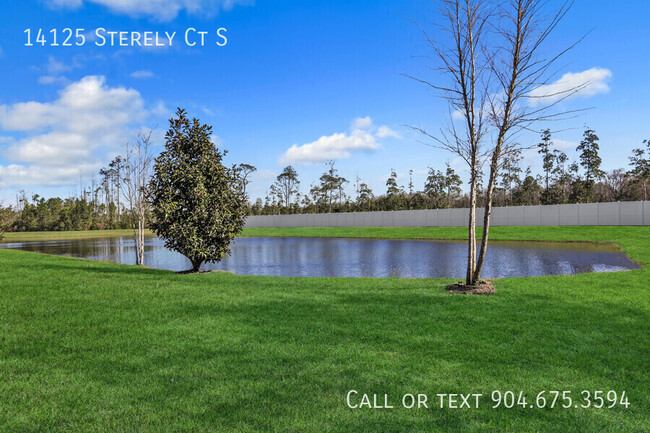 Building Photo - Beautiful Pond-Front Townhome in Wells Cre...