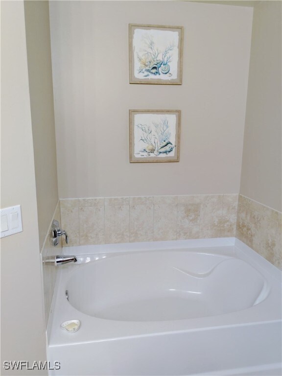 Building Photo - 10127 Villagio Palms Way