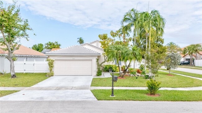 Building Photo - Northwest 19th Street, Miami, FL 33029 - 3 BR 2 BA single-family home