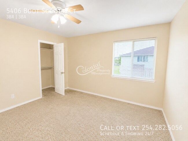 Building Photo - 5406 Boot Scootin Ct