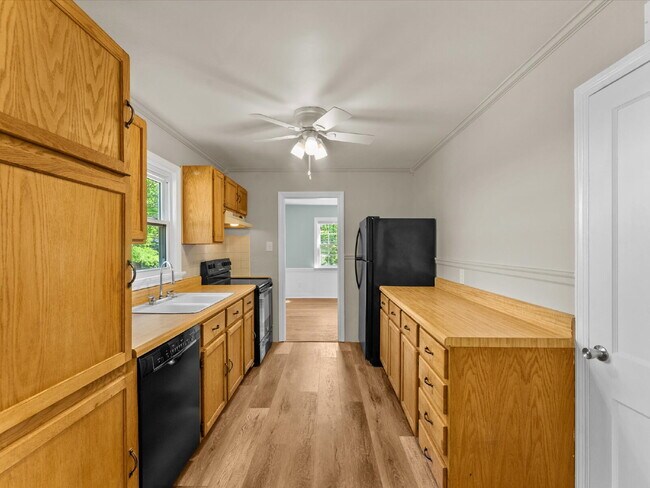 Building Photo - 7602 Woodman Rd