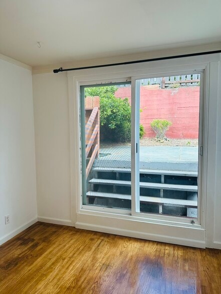 Staircase to yard through sliding door - 245 Concord St