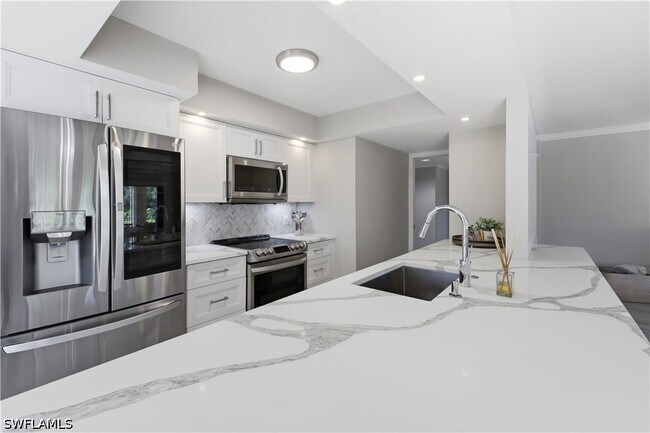 Building Photo - 6080 Pelican Bay Blvd