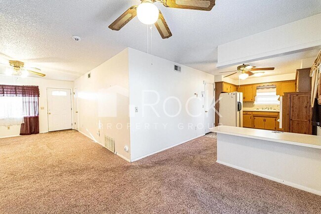 Building Photo - 3 Bedroom Home with 2-Car Garage and Covered Parking