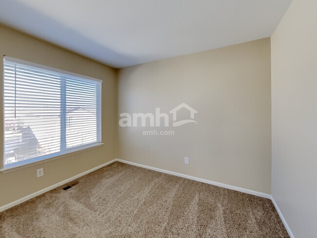 Building Photo - 19459 E 50th Dr