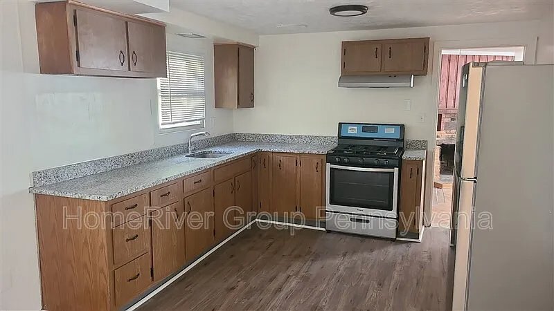 Building Photo - 6037 Poketa Rd