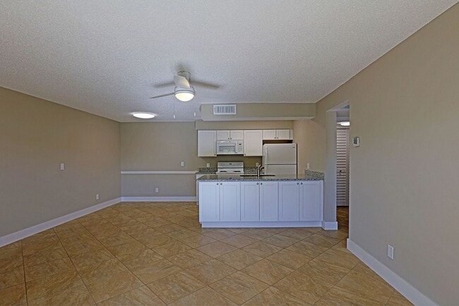 Building Photo - Mystic Gardens 5303-316