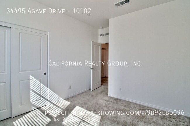 Building Photo - 34495 Agave Dr