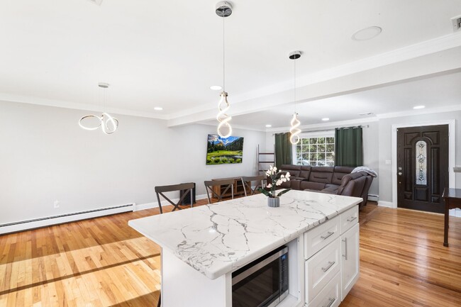 Building Photo - "Charming 3-Bed Rockaway Gem with Granite ...