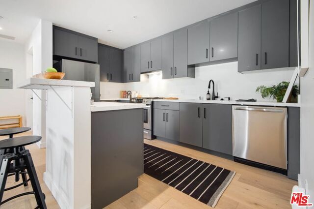 Building Photo - 3400 Sunset Blvd