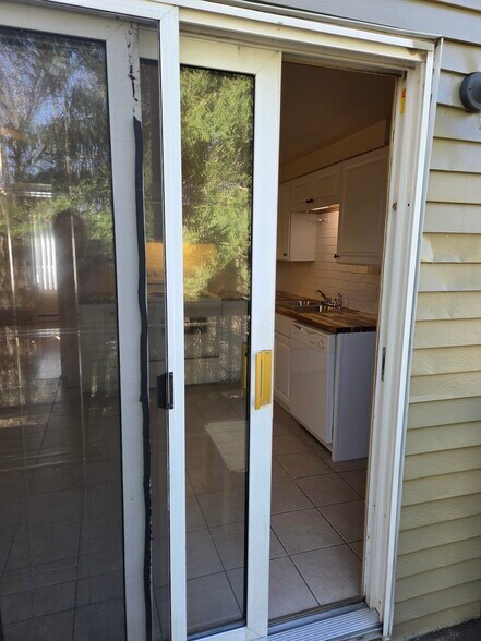 Sliding door leads to back deck - 496 Mercer Rd