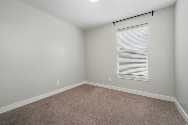 Building Photo - Modern 3-Bedroom Condo in Prime Riverton L...