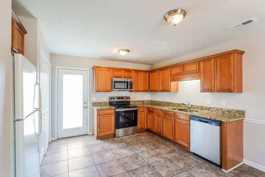 Building Photo - 7480 Maggie Dr