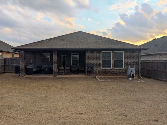 Building Photo - Modern Norman Home | Storm Shelter, Covered Patio, Community Pond & Park!