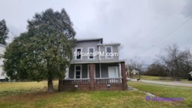 Building Photo - 9804 Miles Ave