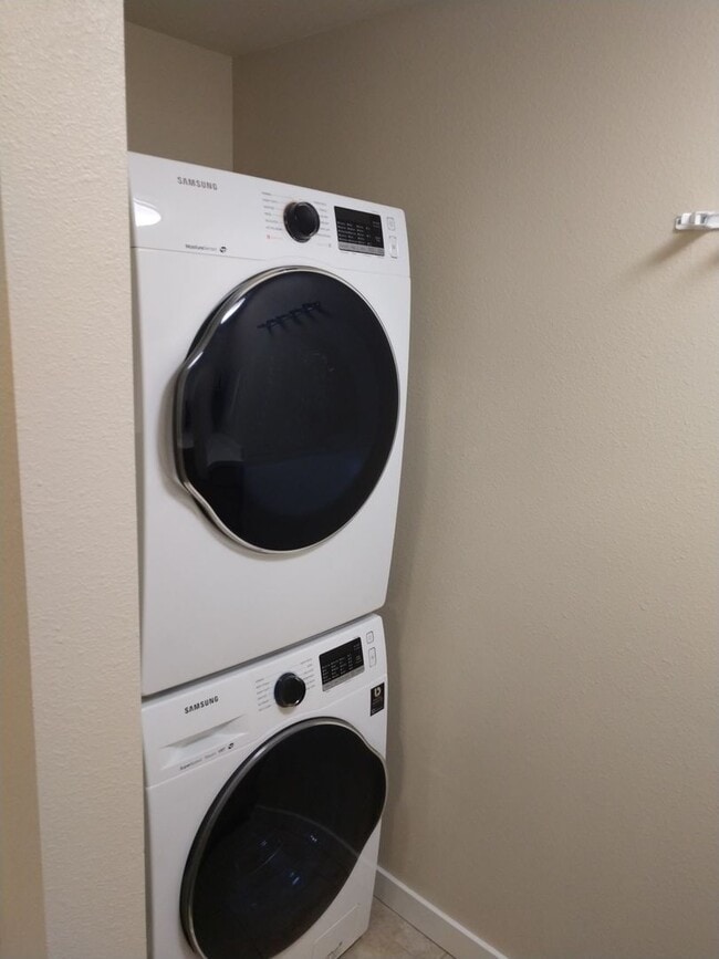 Building Photo - SAVE MONEY ON EXTENDED STAYS.  Beautiful Furnished and Completly Supplied Condo in Downtown Misso...