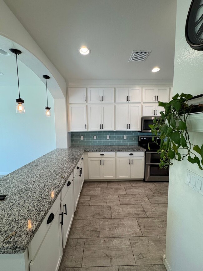 Building Photo - Upgraded Corner Townhome in the Heart of G...