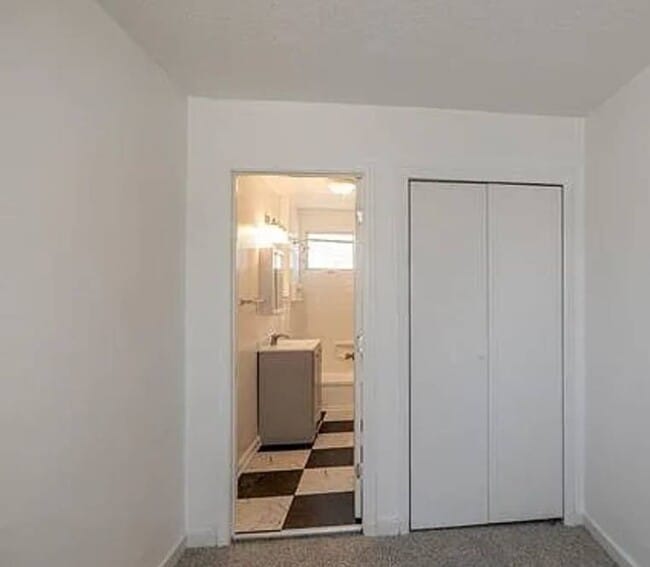 Building Photo - Newly Renovated 4BR/1BA Single-Family Home with Garage – Cleveland