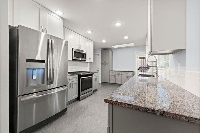 Building Photo - Available NOW! 4 Bedroom 3 Bath Beautiful ...