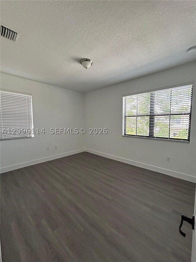 Building Photo - 9883 W 34th Ln