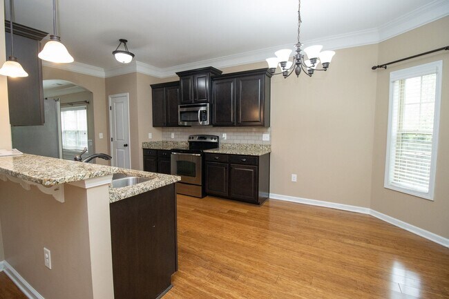 Building Photo - Elegant All-Brick 4 Bedroom Home on a Quie...