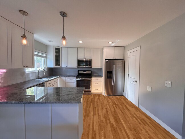 Building Photo - $0 DEPOSIT OPTIONS. SPACIOUS 4-BEDROOM, 3.5-BATH DUPLEX OFF 6TH AVE FREEWAY, MINUTES FROM COLORAD...