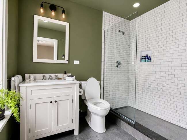 Walk-In Shower - The Granite Building