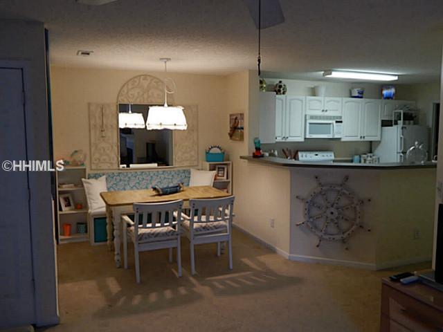 Dining room adjacent to kitchen - 100 Kensington Blvd